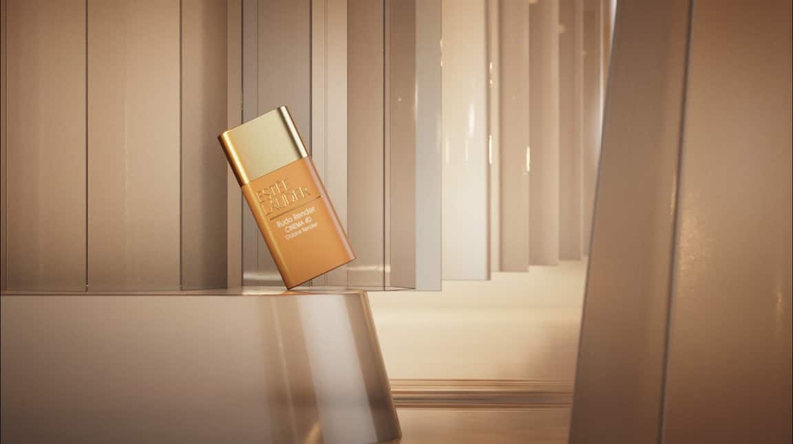 Cinematic product film frame — serum behind falling sheer fabric